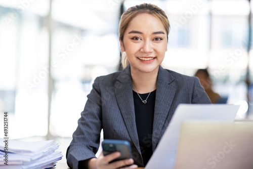 Asian Woman entrepreneur busy with her work in the office. Young Asian woman using phone or cellphone while working on computer at her desk.
Free Download Asian Woman entrepreneur busy with her work in the office. Young Asian woman using phone or cellphone while working on computer at her desk.
- GFXLoad