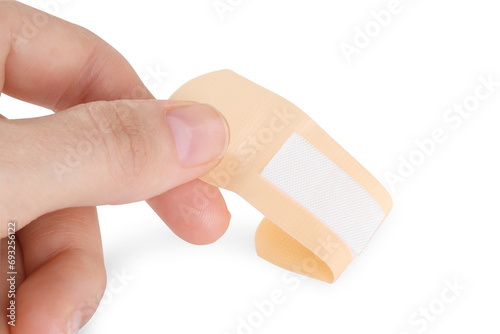 Woman with medical adhesive bandage isolated on white, closeup