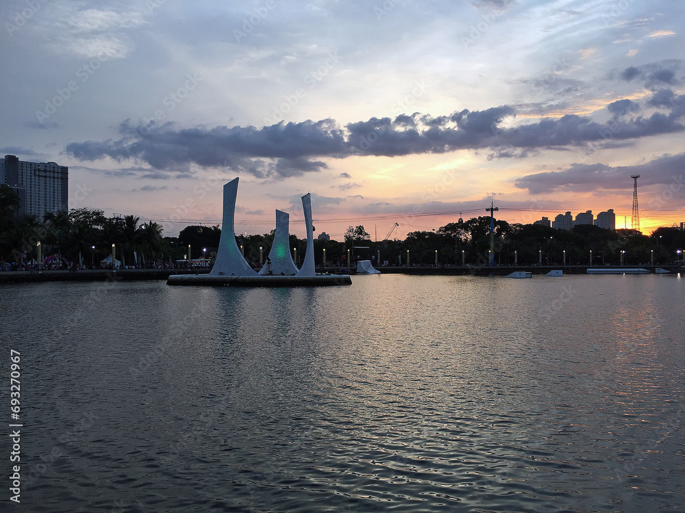 Naklejka premium sunset - Ancol beach Jakarta, a very beautiful and exotic place in the capital of Indonesia