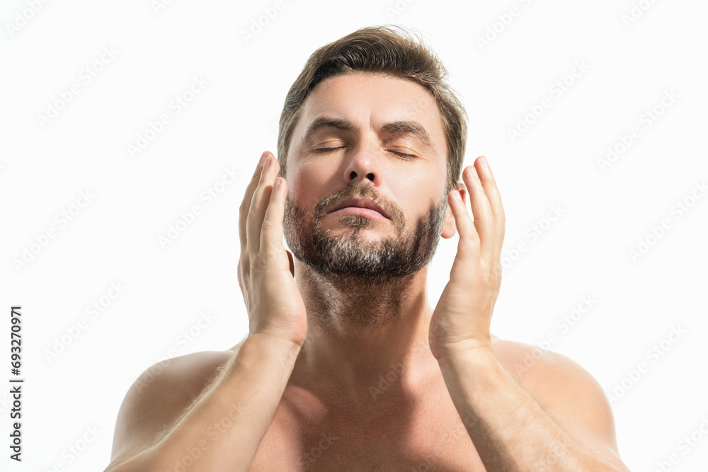 Sexy shirtless man close up portrait care of skin, isolated over white background. Charming man with perfect smooth soft skin. Spa therapy. Man, face, beauty and skincare concept. Sexy shirtless man close up portrait care of skin, isolated over white background. Charming man with perfect smooth soft skin. Spa therapy. Man, face, beauty and skincare concept.