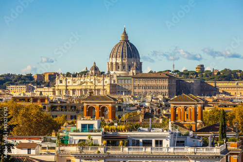 View of St. Peter's Basilica in Vatican, Italy at sunset photo