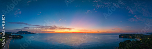 .aerial panorama beautiful sunset at Surin beach Phuket..amazing colorful cloud in beautiful sky at sunset..Scene of Colorful romantic sky sunset with cloud in the sky background..