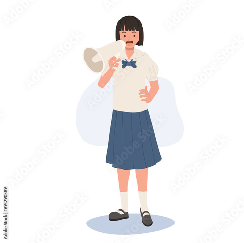 Thai Student in Uniform Empowering Voice with Megaphone. Using Megaphone for Confident Announcement