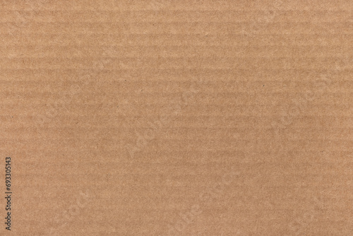 Brown cardboard texture, background sample, studio shot.