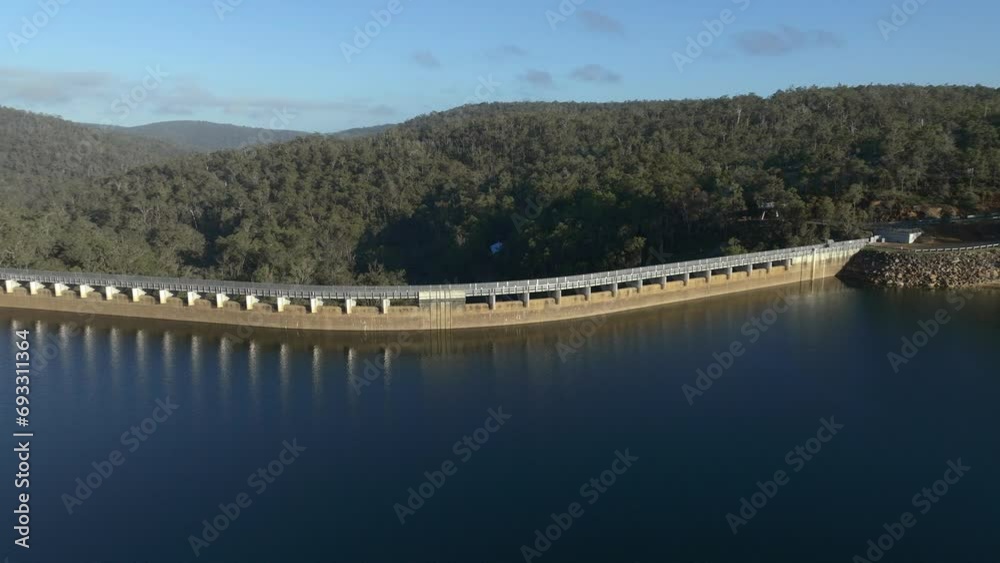 Late morning panning shot of the dam wall showing the sprawling forests of south west Western Australia behind the dam wall. Late morning panning shot of the dam wall showing the sprawling forests of south west Western Australia behind the dam wall.