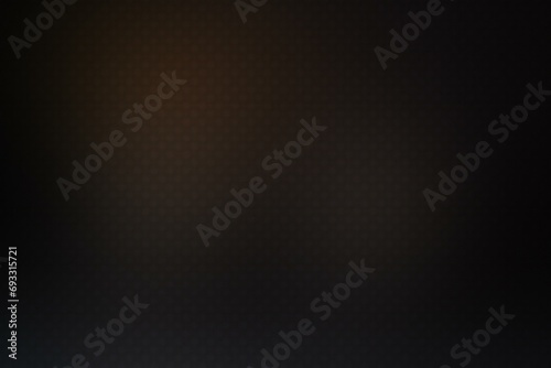 Abstract background of a black and brown color with a glowing pattern