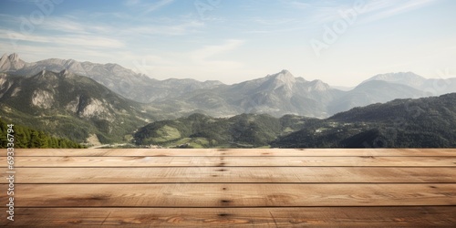 Wooden surface with mountain view or desk with nature backdrop, space for text.