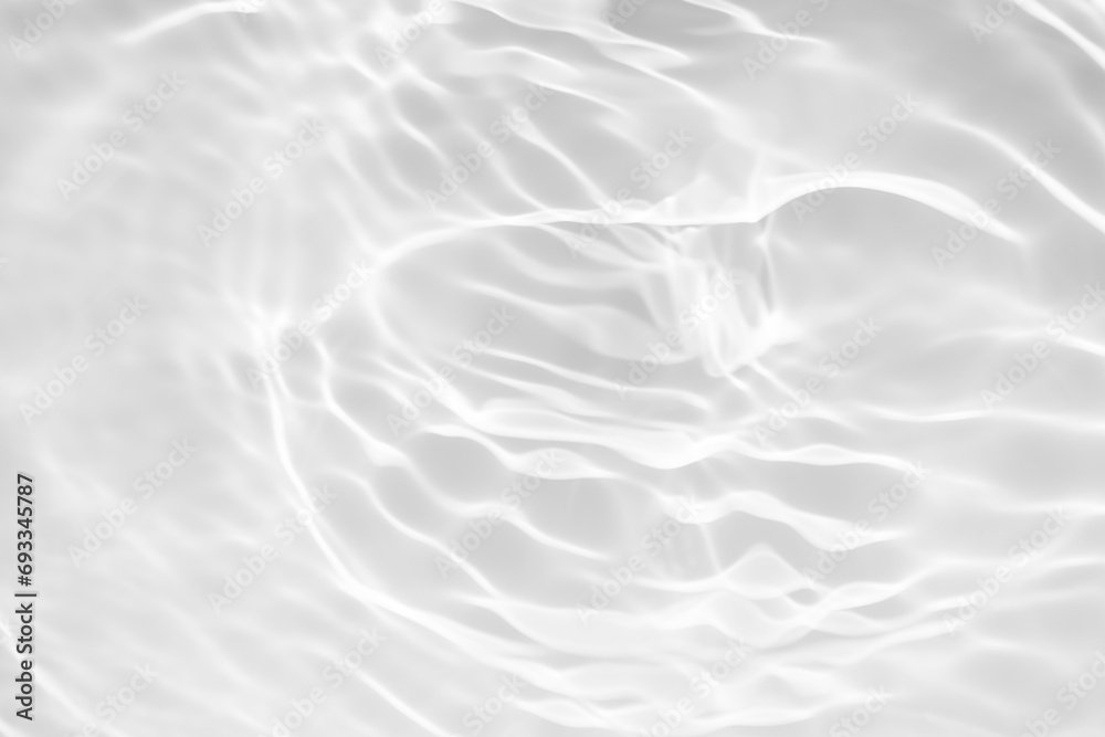White water with ripples on the surface. Defocus blurred transparent white colored clear calm water surface texture with splashes and bubbles. Water waves with shining pattern texture background. White water with ripples on the surface. Defocus blurred transparent white colored clear calm water surface texture with splashes and bubbles. Water waves with shining pattern texture background.