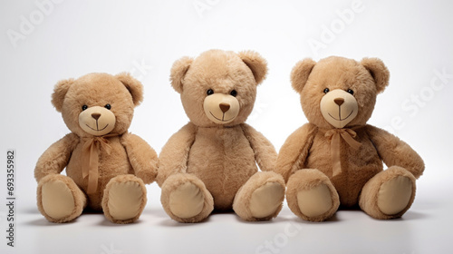 A set of three teddy bears on a white background © frimufilms