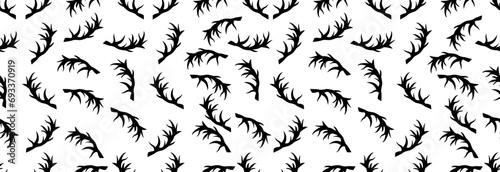 Scattered deer antlers, seamless pattern.