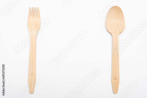 Wooden Cutlery, Eco Tableware, Disposable Cutlery, Recycle. Eco food packaging concept, zero waste paper, sustainability.