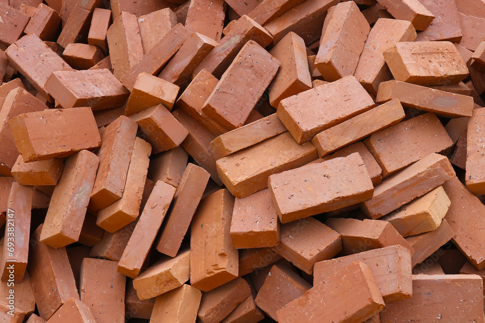 A Heap of Red building Bricks. It can be used as background.