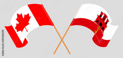 Crossed and waving flags of Canada and Gibraltar