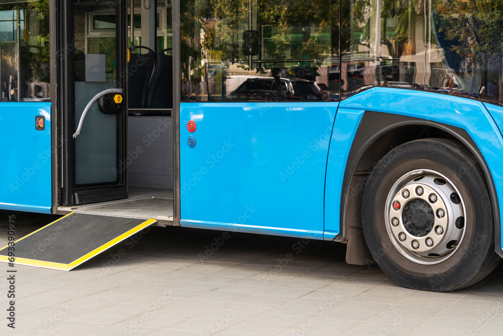 Bus ramp low floor. Accessibility in public transport. Bus ramp low ...
