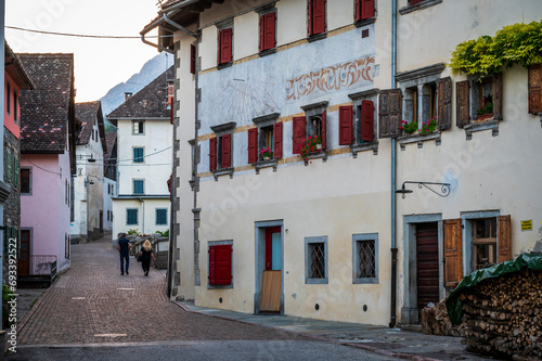 Pesariis, the town of watches. Walk in the town between dusk and night photo