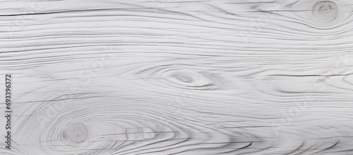 Natural light highlights white and grey wooden texture.