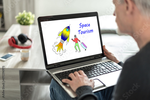 Space tourism concept on a laptop screen
