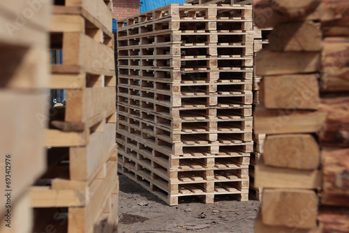 Wooden pallets are available. Stacking of wooden pallets.Eco-friendly products. Pallets made of renewable wood.