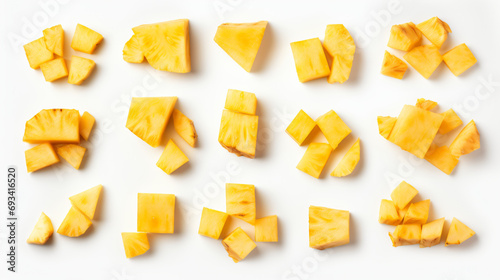 Pineapple pieces isolated on white background photo