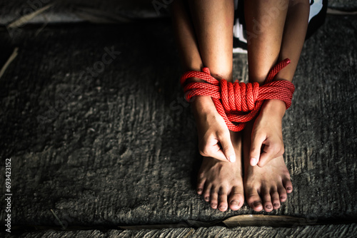 Stop the use of violence against young boys who are abused and locked up with their hands and feet bound. stop human trafficking photo