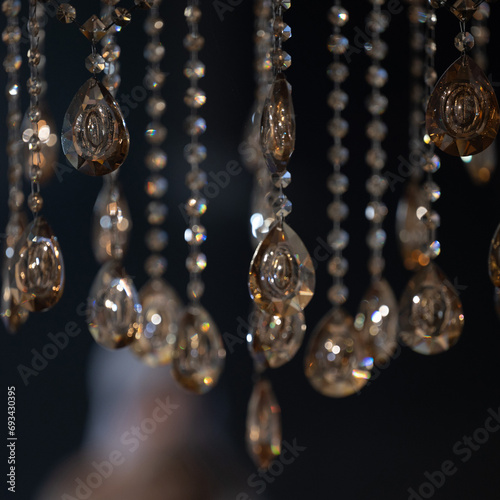 Crystal on a chandelier close-up on a dark background.