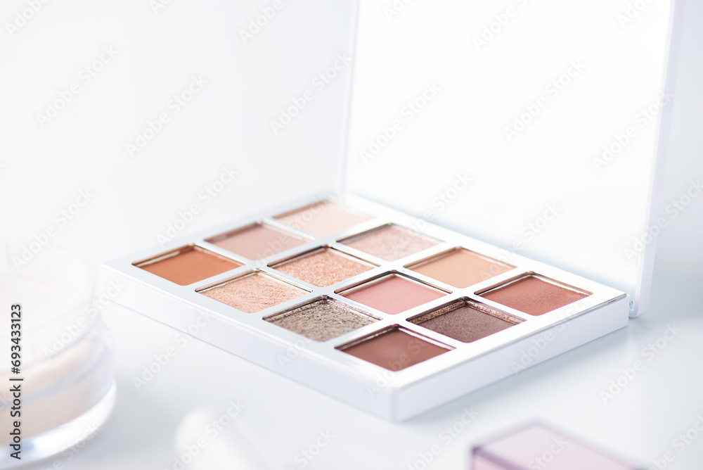 Eye shadow palette on a light background. Eye shadow palette on a light background.