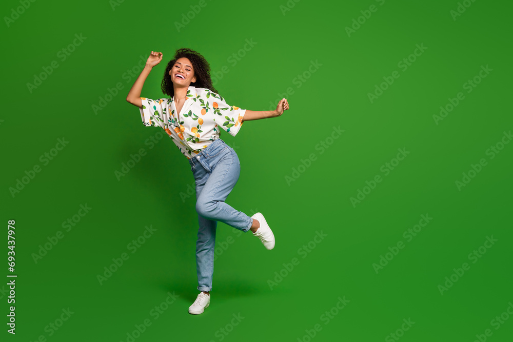 Photo of positive cheerful millennial girl dancing on weekend party event occasion isolated bright color background Photo of positive cheerful millennial girl dancing on weekend party event occasion isolated bright color background