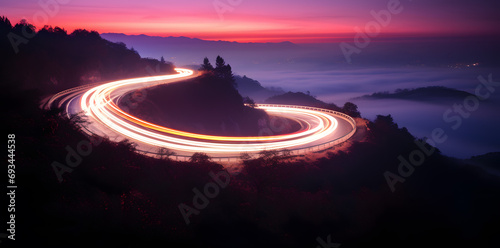 Photo of a highway at night. Neon night highway track with colorful lights and trails photo