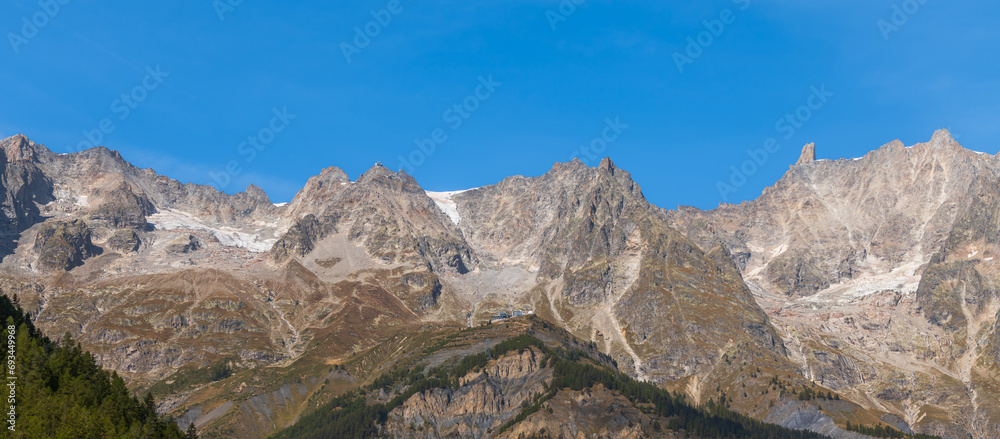 Panoramic view of the Alps in autumn, near Courmayeur, Aosta Valley, Italy