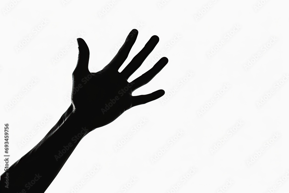 Dark silhouette hand behind glass on white background