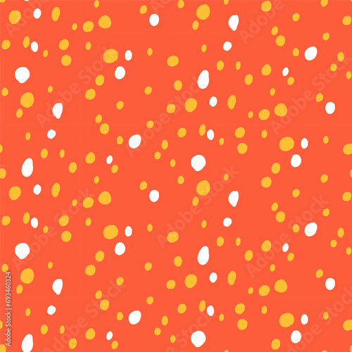 Polka dot doodle pattern with different hand drawn rounded spots isolated on red  orange background. White  yellow dotted wallpaper.