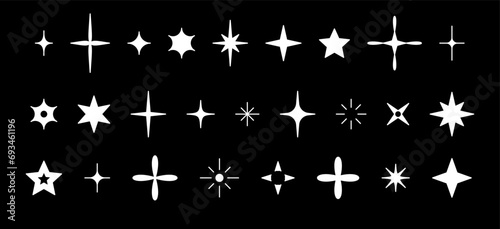 Set with white silhouettes glitter  stars and sequins. Doodle glitter isolated on black background.