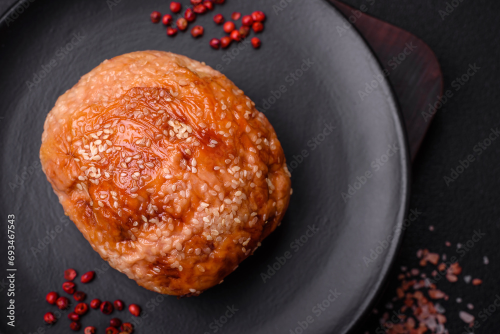 Delicious baked chicken or turkey meat roll with salt and spices