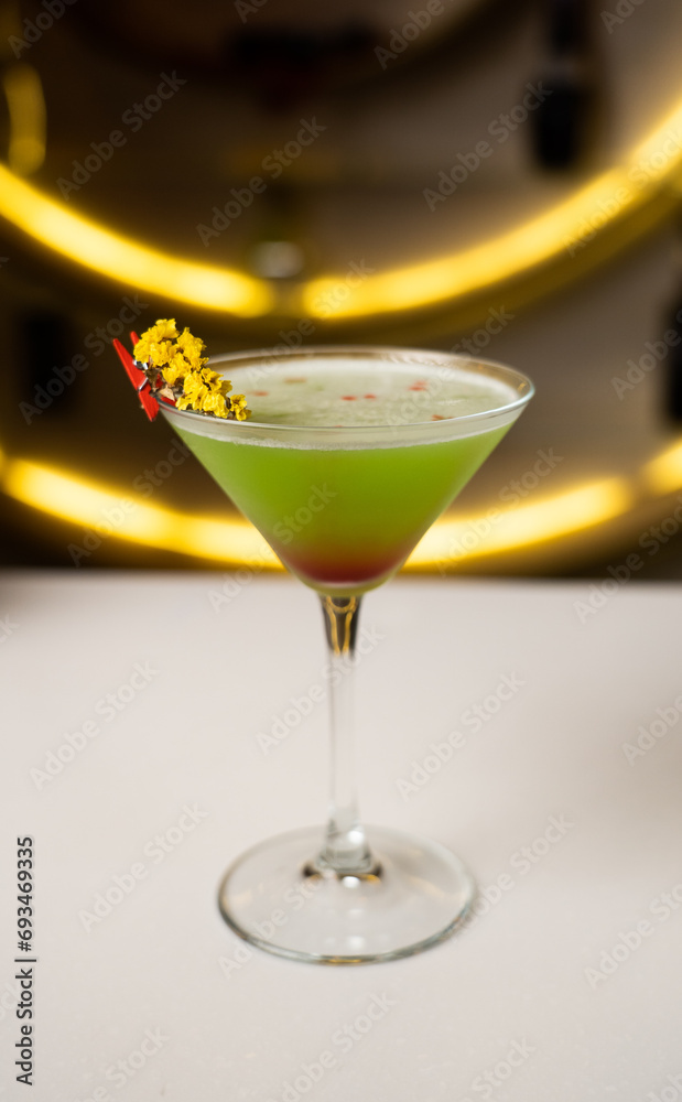 Alcoholic cocktail on a black background. Concept of cocktails and alcohol Alcoholic cocktail on a black background. Concept of cocktails and alcohol