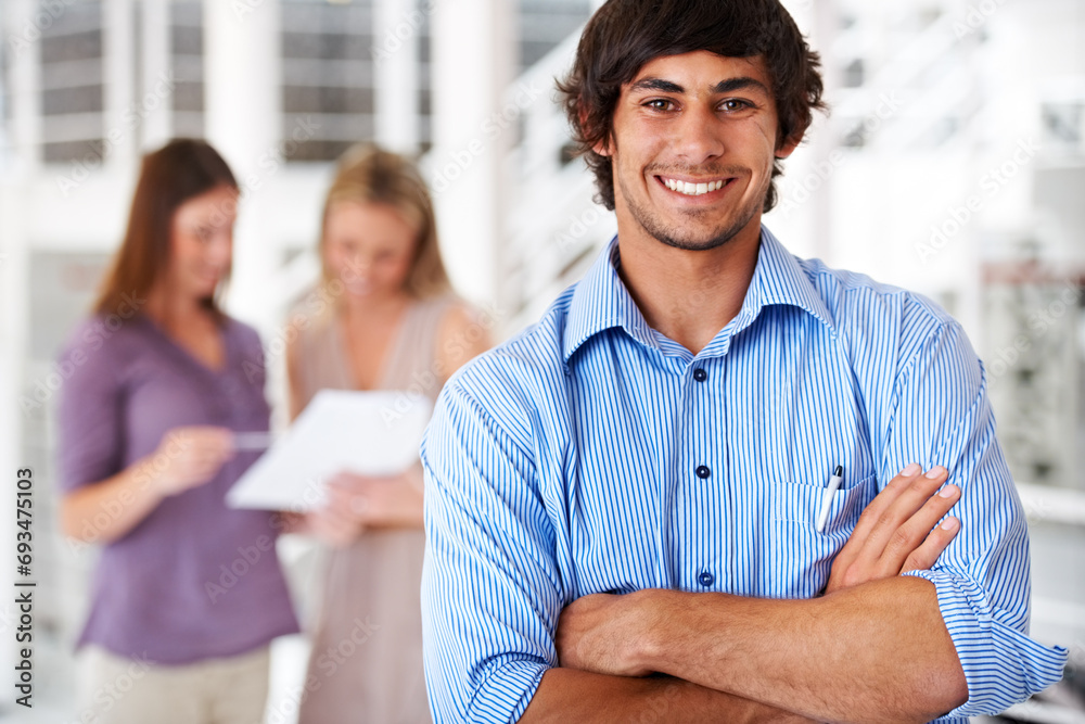 Obraz premium Happy, crossed arms and portrait of business man with team for leadership, confidence and pride. Creative agency, company and worker with staff for meeting, planning and collaboration in office