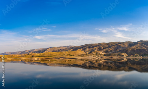 Panoramic view of the Tigris River. Reflection of the mountains in the river.
