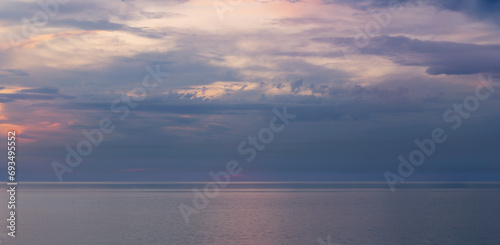 beautiful sky with clouds and sea at sunset