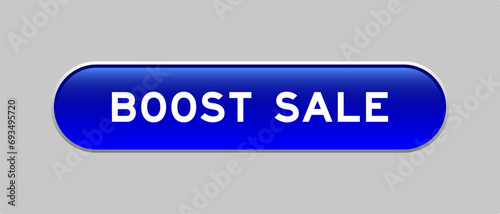 Blue color capsule shape button with word boost sale on gray background