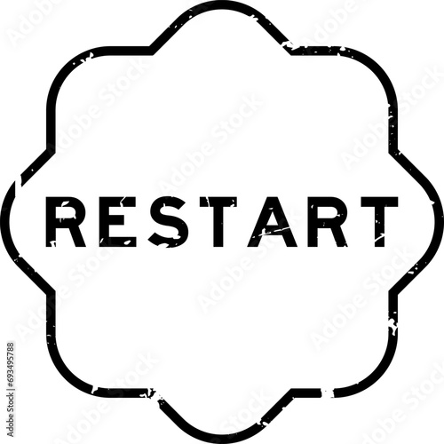 Grunge black restart word rubber seal stamp on white background photo