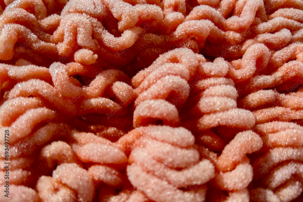 Close-up on the texture of minced meat, meat. Close-up on the texture of minced meat, meat.
