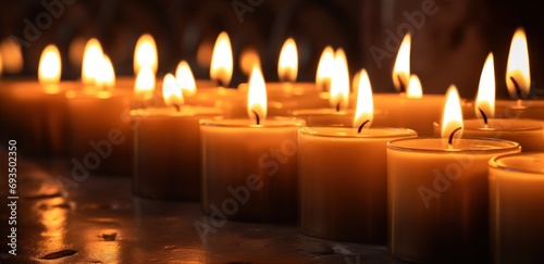 Candlemas. Light of the world. Christian Holiday. Burning candles on a black background with reflection and copy space.