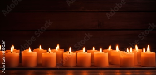 Candlemas. Light of the world. Christian Holiday. Burning candles on a black background with reflection and copy space.