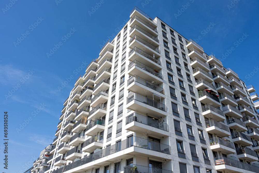 Fototapeta premium Big white apartment building with balconies seen in Berlin, Germany