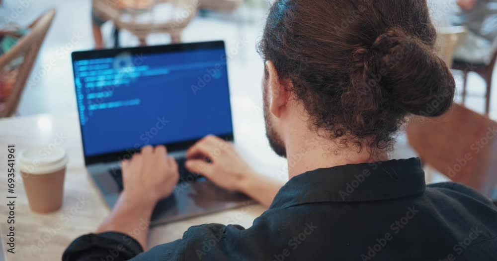 Coffee shop coding concept. A programmer sitting in a bustling coffee ...