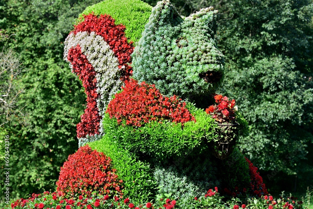 Ornamental decoration and tourist attraction squirrel made of ornamental flowers