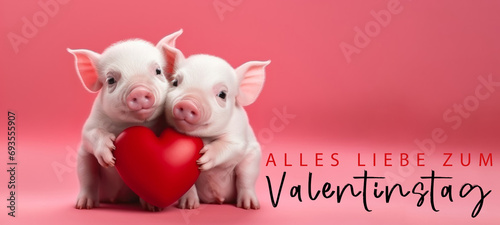 Alles Liebe zum Valentinstag, Grußkarte mit deutschem Text - Niedliches Schwein Baby Päärchen hält rotes Herz , isoliert auf pinkem Hintergrund © Corri Seizinger