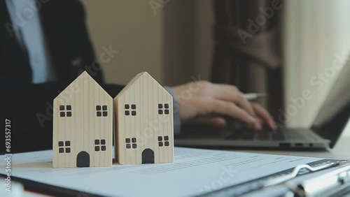 Wallpaper Mural Considering buying a home, investing in real estate. Broker signs a sales agreement. agent, lease agreement, successful deal. Torontodigital.ca