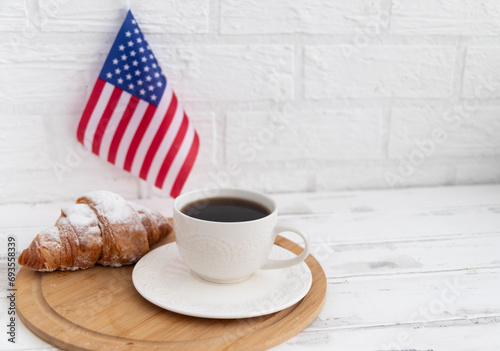 American flag, coffee and croissant breakfast.Elections