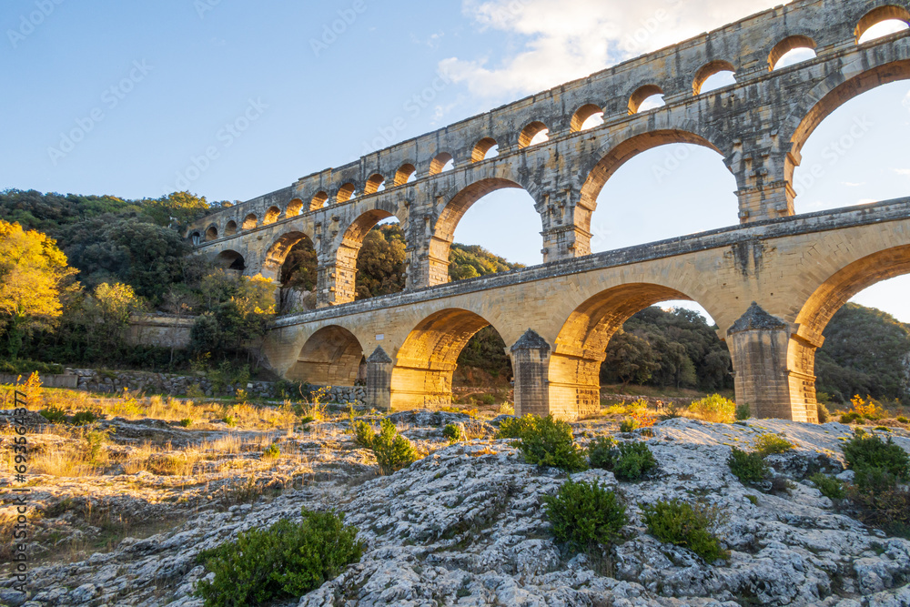 Fototapeta premium The magnificent Pont du Gard, at setting sun., ancient Roman aqueduct bridge. Photography taken in Provence, southern France
