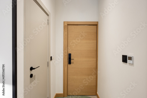 Hotel room corridor with doors